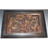 Chinese carved relief moulded plaque, 30 x 50cm