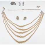 A 9ct gold necklace made up of rectangular links (1.7g), silver brooch set with paste, faux