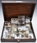 An annotated collection of geological and fossil samples including ammonites, corundum, flints for