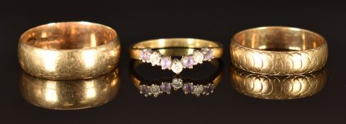 Two 9ct gold wedding bands/ rings (sizes M/N, 2.5g and Q, 3.3g) and a 9ct gold ring set with