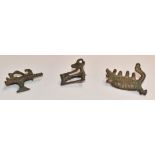 Three Roman bronze brooches including axe and stag