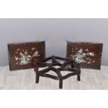 Chinese hardwood table base and two mother-of-pearl inlaid rosewood panels, 56 x 43cm