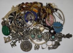 A collection of silver jewellery including enamel filigree brooch, charm bracelet, pendants,
