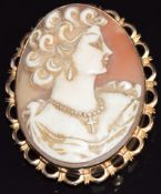 A 9ct gold pendant/brooch set with a cameo, signed to verso, 3.5 x 4.6cm