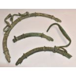 A pair of Roman bronze handles with hand finials and swivel grips, one with mythical creature