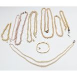 A double strand cultured pearl necklace, a cultured pearl necklace, Swarovski bracelet and faux