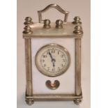Miniature c1930s carriage style clock with blue steel hands on engine turned Arabic dial, in