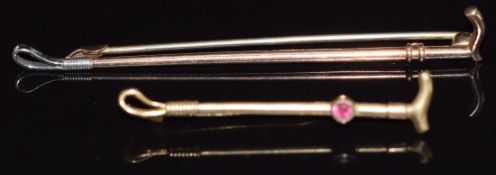 A 9ct gold brooch in the form of a riding crop (2.2g) and similar rolled gold example