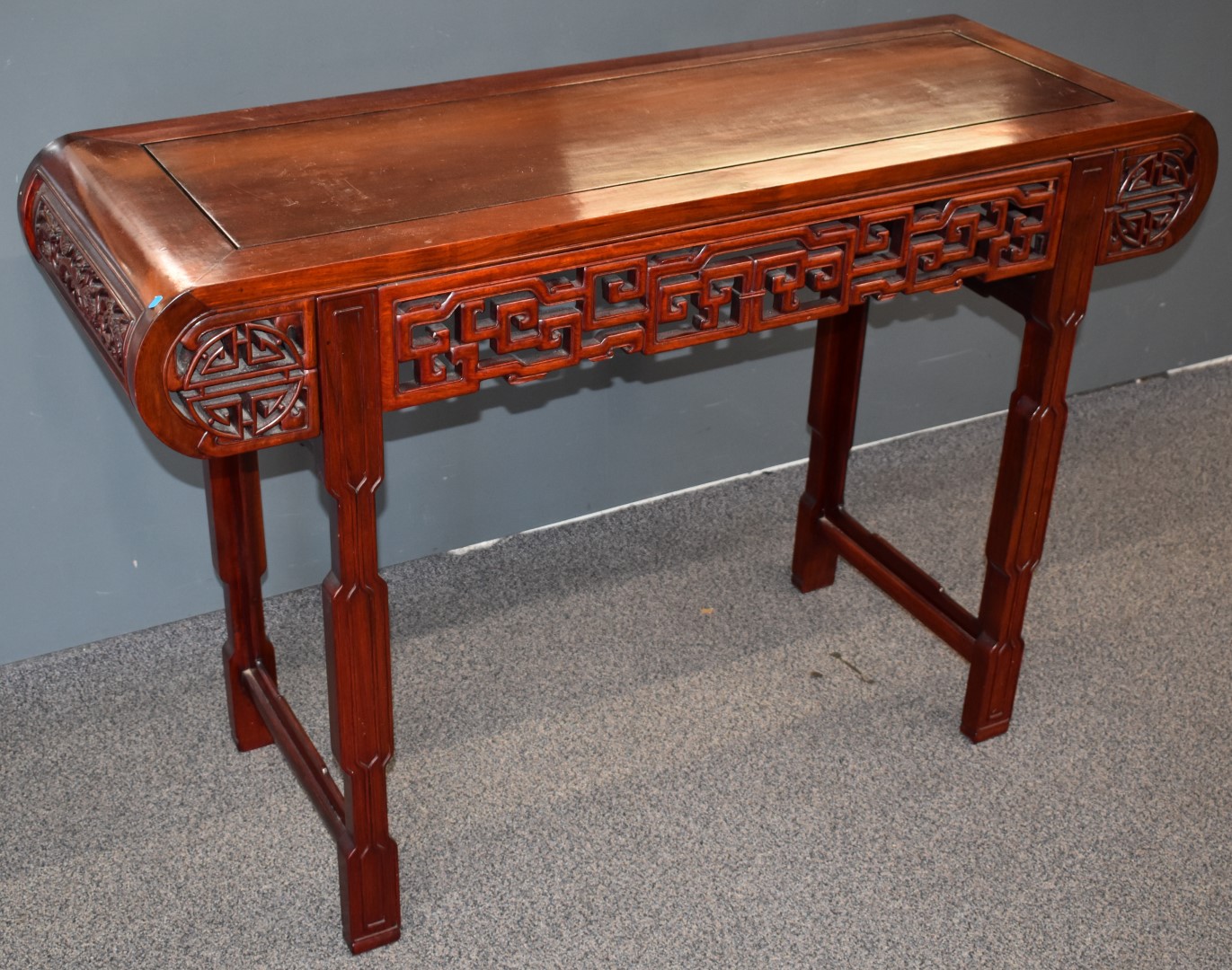 Carved oriental hardwood altar table with carved decoration, W127 x D43 x H83cm - Image 2 of 3