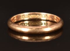 A 9ct rose gold wedding band/ ring, size U, 3.1g