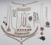 A collection of white metal/ silver jewellery including bracelets, necklaces, brooch, watch chain,