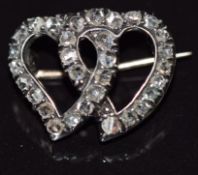 Victorian brooch in the form of two intertwined hearts set with rose cut diamonds, 3g