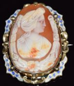 Victorian pinchbeck brooch set with a cameo within an enamel border, 5 x 6.6cm