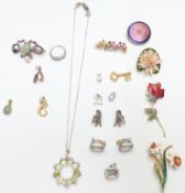 A collection of jewellery including silver pendant, ring and brooch, 9ct gold seahorse charm, 9ct