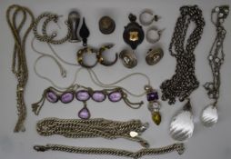 A collection of silver jewellery including fob, earrings, amethyst set necklace, other necklaces,
