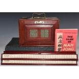 A brass bound Mah Jong set