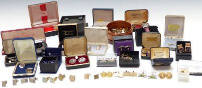 A collection of studs and cufflinks