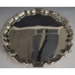 Goldsmiths & Silversmiths Company Ltd George V hallmarked silver salver with shaped edge, raised
