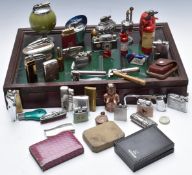 A collection of vintage lighters including Dunhill, Trench Art, novelty etc