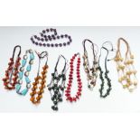 A collection of agate beaded necklaces including amethyst