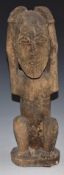 African tribal Yoruba carved figure of a man with hands on head, H39cm