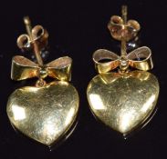 A pair of 18ct gold earrings in the form of a bow and heart, 4.2g