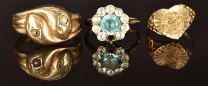 A 9ct gold and silver snake ring, and two 9ct gold rings, one set with zircon