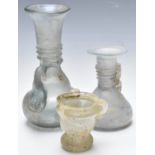 Three Roman / Roman style glass vases, tallest 17cm