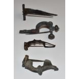 Four Roman brooches including crossbow, large example from Langdon Down etc