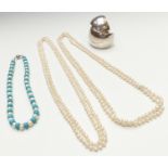 Two pearl necklaces, two silver bangles and a pearl and turquoise necklace