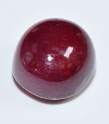 A loose ruby cabochon measuring approximately11.6cts