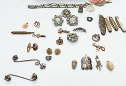 A collection of jewellery including paste brooches, Charles Horner monkey pendant, silver brooch,