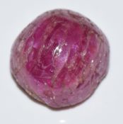 A loose ruby cabochon measuring approximately 34cts
