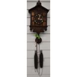 Early to mid 20thC German cuckoo clock with wooden cuckoo and 'pipes', set in architectural form
