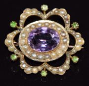Edwardian 9ct gold Suffragette brooch by L & Co, the central amethyst within a surround set with