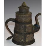 An oriental relief moulded metal sectional teapot, possibly Chinese / Tibetan