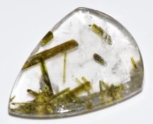 A loose quartz with green tourmaline inclusions, approximately 35cts