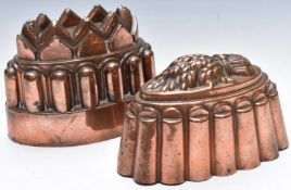 A pair of 19thC copper jelly moulds with impressed marks, length of longest 17cm