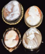 Four brooches set with cameos
