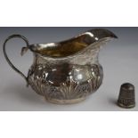 Edward hallmarked silver cream jug London 1903, maker William Hutton & Sons Ltd, length 10.5cm,