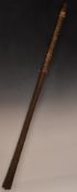 A late 19thC carved Pacific / Oceanic tribal club or staff with linear carved decoration, tapered
