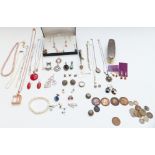 A collection of silver jewellery including bracelet, pendants, earrings, pearl necklace, locket,