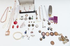 A collection of silver jewellery including bracelet, pendants, earrings, pearl necklace, locket,
