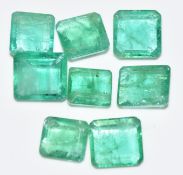 Eight loose emerald cut emeralds, total approximately 6.65cts