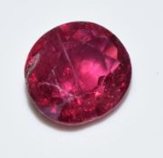 A oval cut loose ruby measuring approximately 1ct