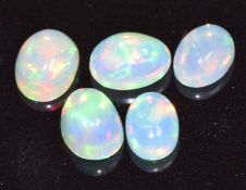 Five loose opal cabochons, measuring a total of approximately 4.45cts