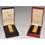 Cartier and Colibri gas retro gold plate lighters, both in original fitted boxes