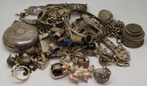 A collection of silver jewellery including curb link necklace, filigree bracelet and brooch, charms,