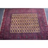 Turkoman large rug on wine ground, 273 x 350cm