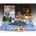 A collection of N gauge model railway buildings, vehicles, track and accessories including Graham